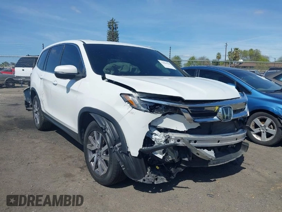 2020 Honda Pilot EX-L with VIN 5FNYF5H59LB027265, listed as a IAAI auction lot 41826300 with 57,201 mi miles. Bid and sale history available at carsss.com. Image 1.