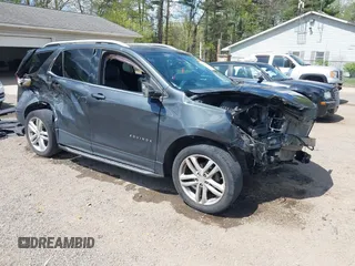 2018 Chevrolet Equinox LT z VIN 3GNAXSEV0JL392022, wystawiony jako IAAI lot #42112780 z przebiegiem 99 582 mil mil oraz . Historia ofert i sprzedaży dostępna na DreamBid. Obrazek 1.