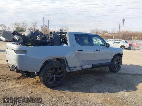 2025 Rivian R1T Adventure z VIN 7FCTGBAAXSN035740, wystawiony jako IAAI lot #41728515 z przebiegiem 3 773 mil mil oraz . Historia ofert i sprzedaży dostępna na DreamBid. Obrazek 18.