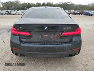 2022 BMW 5 Series M550i xDrive z VIN WBA13BK02NCH74485, wystawiony jako Copart lot #78734134 z przebiegiem 35 332 mil mil oraz Szkoda całkowita • Salvage title. Historia ofert i sprzedaży dostępna na DreamBid. Obrazek 6.