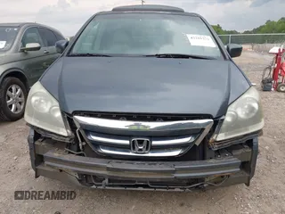2006 Honda Odyssey EX-L z VIN 5FNRL38756B420817, wystawiony jako IAAI lot #42101271 z przebiegiem 203 892 mil mil oraz . Historia ofert i sprzedaży dostępna na DreamBid. Obrazek 13.