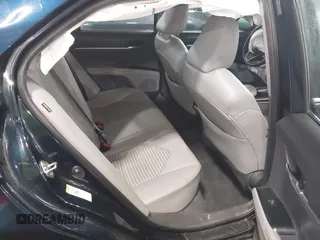2018 Toyota Camry LE z VIN 4T1B11HK8JU517019, wystawiony jako IAAI lot #42220646 z przebiegiem 98 924 mil mil oraz . Historia ofert i sprzedaży dostępna na DreamBid. Obrazek 8.