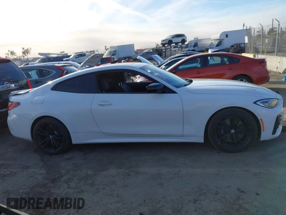 2021 BMW 4 Series M440i xDrive with VIN WBA13AR09MCF64044, listed as a IAAI auction lot 41391508 with 29,007 mi miles and . Bid and sale history available at DreamBid. Image 13.
