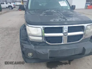 2007 Dodge Nitro SXT with VIN 1D8GU28K27W569672, listed as a IAAI auction lot 41868853 with 179,145 mi miles and . Bid and sale history available at carsss.com. Image 6.