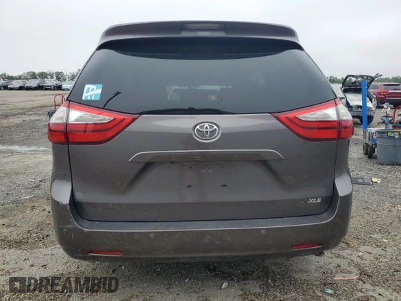 2015 Toyota Sienna XLE with VIN 5TDYK3DC7FS647939, listed as a Copart auction lot 60900055 with 249,551 mi miles and Clean title. Bid and sale history available at DreamBid. Image 6.