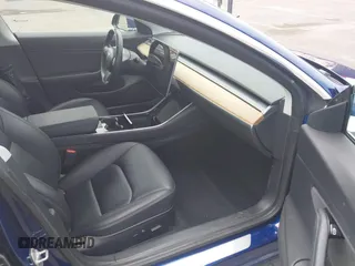 2018 Tesla Model 3 Long Range Battery z VIN 5YJ3E1EA6JF160859, wystawiony jako IAAI lot #42149636 z przebiegiem 81 159 mil mil oraz . Historia ofert i sprzedaży dostępna na DreamBid. Obrazek 5.