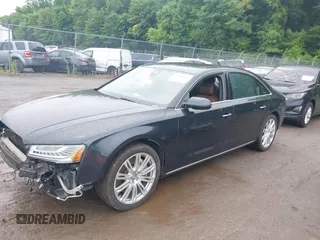 2015 Audi A8 3.0T z VIN WAU3GAFD9FN001343, wystawiony jako IAAI lot #39846084 z przebiegiem 105 242 mil mil oraz . Historia ofert i sprzedaży dostępna na DreamBid. Obrazek 22.