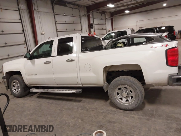 2014 Chevrolet Silverado 1500 Work Truck with VIN 1GCVKPEH5EZ249288, listed as a IAAI auction lot 41479579 with 141,549 mi miles and . Bid and sale history available at DreamBid. Image 14.