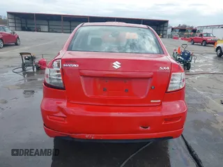 2009 Suzuki SX4 Sport FWD with VIN JS2YC414596200021, listed as a IAAI auction lot 40753192 with 144,805 mi miles and . Bid and sale history available at DreamBid. Image 16.