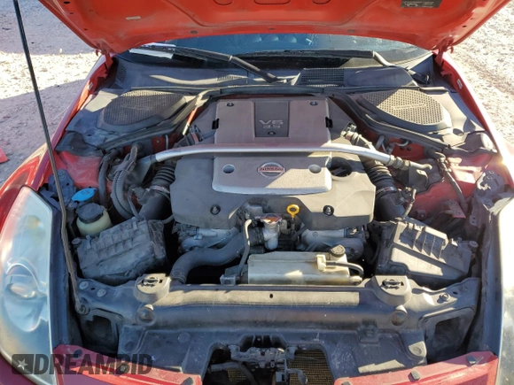 2008 Nissan 350Z Touring z VIN JN1BZ34D18M700839, wystawiony jako Copart lot #80797034 z przebiegiem 145 093 mil mil oraz Szkoda całkowita • Salvage title. Historia ofert i sprzedaży dostępna na DreamBid. Obrazek 11.