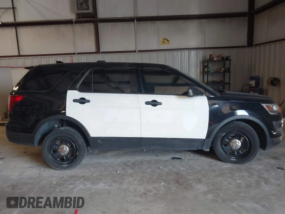 2017 Ford Police Interceptor Utility with VIN 1FM5K8ARXHGC63042, listed as a IAAI auction lot 42449445 with 82,606 mi miles and . Bid and sale history available at DreamBid. Image 14.