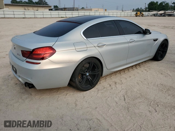 2017 BMW M6 z VIN WBS6E9C56HG437374, wystawiony jako Copart lot #54277624 z przebiegiem 80 858 mil mil oraz . Historia ofert i sprzedaży dostępna na DreamBid. Obrazek 3.