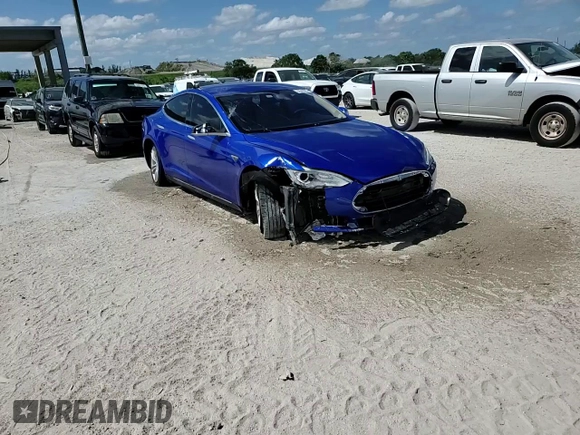 2014 Tesla Model S 60 with VIN 5YJSA1S14EFP44162, listed as a Copart auction lot 52943025 with Not Provided miles and Salvage Title. Bid and sale history available at DreamBid. Image 13.