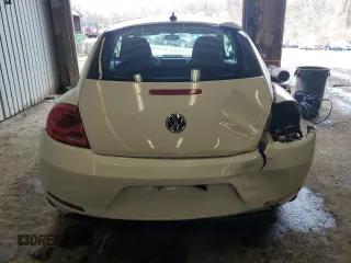 2014 Volkswagen Beetle 2.5L w/Sun with VIN 3VWJP7AT1EM612064, listed as a Copart auction lot 48005055 with 62,290 mi miles and Salvage Title. Bid and sale history available at DreamBid. Image 6.