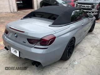 2016 BMW M6 z VIN WBS6G9C54GD932196, wystawiony jako Copart lot #53960063 z przebiegiem 46 162 mil mil oraz . Historia ofert i sprzedaży dostępna na DreamBid. Obrazek 4.
