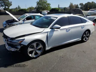2018 Honda Accord Touring with VIN 1HGCV1F9XJA018710, listed as a Copart auction lot 56143685 with 146,625 mi miles and Salvage title. Bid and sale history available at DreamBid. Image 1.