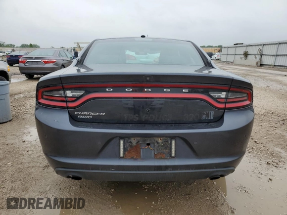 2019 Dodge Charger Police with VIN 2C3CDXKT1KH582405, listed as a Copart auction lot 57046445 with 136,171 mi miles and Salvage title. Bid and sale history available at DreamBid. Image 6.
