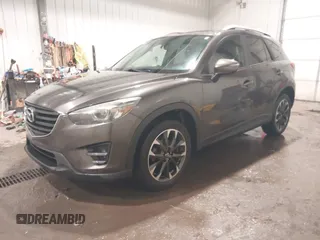 2016 Mazda CX-5 Grand Touring with VIN JM3KE4DY0G0732843, listed as a IAAI auction lot 41520889 with 149,798 mi miles. Bid and sale history available at carsss.com. Image 17.