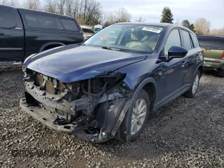 2013 Mazda CX-5 Touring with VIN JM3KE4CE0D0124520, listed as a Copart auction lot 45841645 with 136,244 mi miles and Salvage Title. Bid and sale history available at carsss.com. Image 1.