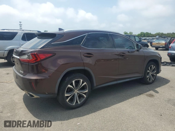 2016 Lexus RX 350 с VIN JTJBZMCA3G2007594, выставлен на аукционе Copart как лот 63078035 с пробегом 140 372 миль миль и Списание • Salvage title. История ставок и продаж доступна на DreamBid. Изображение 3.