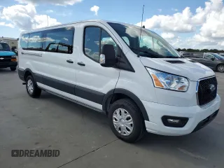 2022 Ford Transit Passenger XL with VIN 1FBAX2Y84NKA83986, listed as a Copart auction lot 77745014 with Not Provided miles and Salvage Title. Bid and sale history available at DreamBid. Image 4.