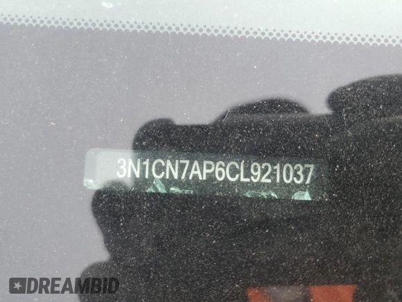 2012 Nissan Versa SV z VIN 3N1CN7AP6CL921037, wystawiony jako Copart lot #58689265 z przebiegiem 107 697 mil mil oraz Szkoda całkowita • Salvage title. Historia ofert i sprzedaży dostępna na DreamBid. Obrazek 12.