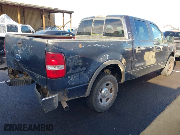 2005 Ford F-150 XLT with VIN 1FTRW12W25KB58736, listed as a IAAI auction lot 41119113 with 218,797 mi miles. Bid and sale history available at carsss.com. Image 4.