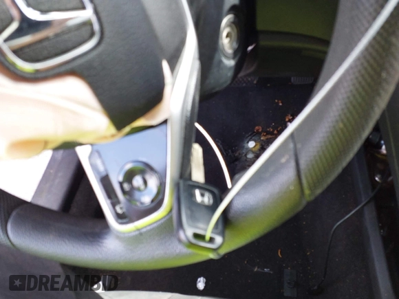 2020 Honda Civic LX with VIN 2HGFC2F65LH575320, listed as a IAAI auction lot 42009564 with Not Provided miles and . Bid and sale history available at DreamBid. Image 11.