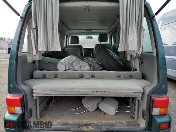 2002 Volkswagen EuroVan MV с VIN WV2NB47092H095600, выставлен на аукционе Copart как лот 50705065 с пробегом 223 049 миль миль и Чистый • Clean title. История ставок и продаж доступна на DreamBid. Изображение 10.