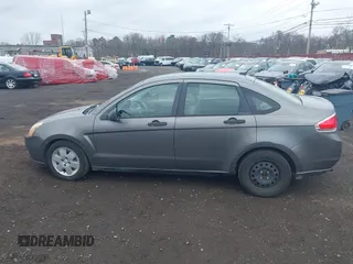 2009 Ford Focus S with VIN 1FAHP34N39W151811, listed as a IAAI auction lot 41911138 with 125,325 mi miles. Bid and sale history available at carsss.com. Image 14.
