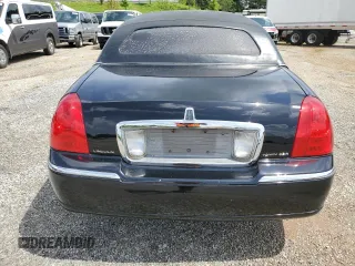 2004 Lincoln Town Car Executive z VIN 1L1FM81W54Y674245, wystawiony jako Copart lot #59638315 z przebiegiem 183 637 mil mil oraz Czysty tytuł • Clean title. Historia ofert i sprzedaży dostępna na DreamBid. Obrazek 6.