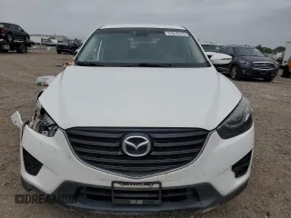 2016 Mazda CX-5 Touring with VIN JM3KE2CY0G0608044, listed as a Copart auction lot 51810175 with 162,232 mi miles and Salvage Title. Bid and sale history available at carsss.com. Image 5.