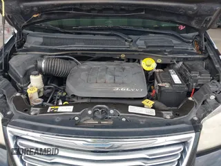 2014 Chrysler Town & Country Touring with VIN 2C4RC1BG8ER296073, listed as a IAAI auction lot 42164103 with 129,006 mi miles and . Bid and sale history available at DreamBid. Image 10.