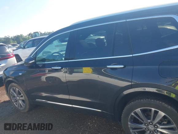 2020 Cadillac XT6 FWD Premium Luxury with VIN 1GYKPCRS0LZ206567, listed as a IAAI auction lot 42254511 with 80,443 mi miles and . Bid and sale history available at DreamBid. Image 15.