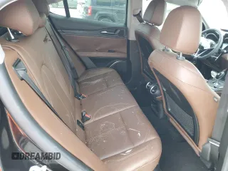 2019 Alfa Romeo Stelvio z VIN ZASPAKAN8K7C49262, wystawiony jako Copart lot #54317625 z przebiegiem Nie podano mil oraz Nie do naprawy • Non repairable. Historia ofert i sprzedaży dostępna na DreamBid. Obrazek 11.