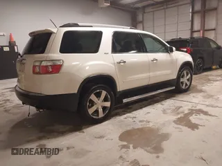 2011 GMC Acadia SLT1 with VIN 1GKKRRED7BJ265501, listed as a IAAI auction lot 41561336 with 152,916 mi miles and . Bid and sale history available at carsss.com. Image 4.