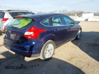 2012 Ford Focus SEL with VIN 1FAHP3M21CL145245, listed as a IAAI auction lot 41320151 with 85,630 mi miles. Bid and sale history available at carsss.com. Image 4.