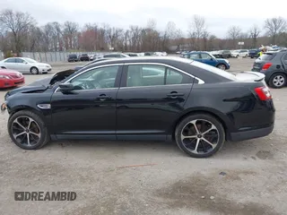 2016 Ford Taurus SEL z VIN 1FAHP2H80GG130887, wystawiony jako IAAI lot #41911575 z przebiegiem 138 469 mil mil oraz . Historia ofert i sprzedaży dostępna na DreamBid. Obrazek 14.