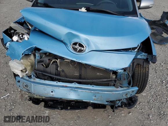 2014 Scion xD with VIN JTKKUPB41E1044556, listed as a Copart auction lot 57123795 with Not provided miles and Salvage title. Bid and sale history available at DreamBid. Image 11.