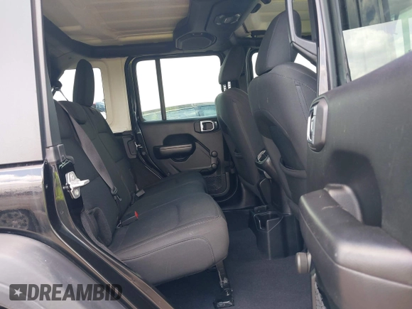 2019 Jeep Wrangler Unlimited Sport S with VIN 1C4HJXDG9KW653488, listed as a IAAI auction lot 42275297 with Not provided miles and . Bid and sale history available at DreamBid. Image 8.