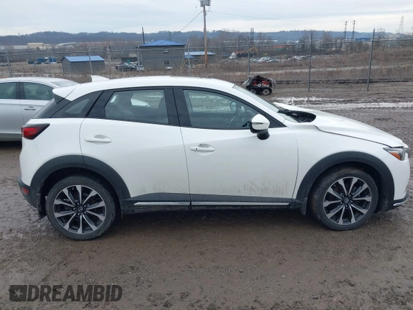 2019 Mazda CX-3 Grand Touring with VIN JM1DKFD76K0426879, listed as a IAAI auction lot 41669200 with 31,881 mi miles. Bid and sale history available at carsss.com. Image 13.
