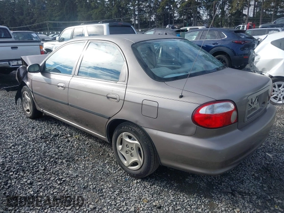 2001 Kia Sephia z VIN KNAFB121815046919, wystawiony jako IAAI lot #41398257 z przebiegiem 191 818 mil mil oraz . Historia ofert i sprzedaży dostępna na DreamBid. Obrazek 3.
