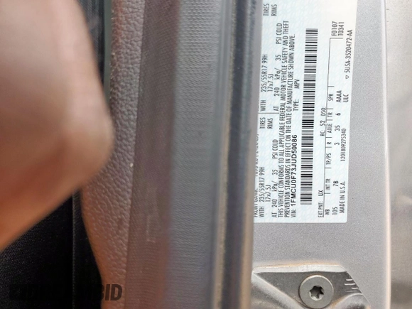 2018 Ford Escape S z VIN 1FMCU0F73JUD50086, wystawiony jako Copart lot #65004825 z przebiegiem Nie podano mil oraz Szkoda całkowita • Salvage title. Historia ofert i sprzedaży dostępna na DreamBid. Obrazek 13.