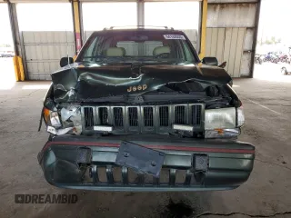 1995 Jeep Grand Cherokee Limited with VIN 1J4GZ78Y2SC723898, listed as a Copart auction lot 54142035 with 173,454 mi miles and Salvage Title. Bid and sale history available at carsss.com. Image 5.