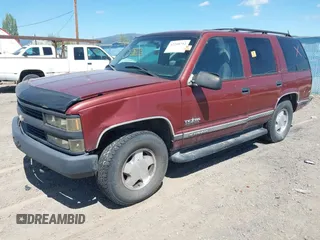 1999 Chevrolet Tahoe Z71 with VIN 1GNEK13R4XJ341736, listed as a IAAI auction lot 42218712 with 282,663 mi miles and . Bid and sale history available at DreamBid. Image 2.
