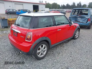 2010 MINI Hardtop with VIN WMWMF3C51ATZ65259, listed as a IAAI auction lot 42248896 with 106,216 mi miles and . Bid and sale history available at DreamBid. Image 4.