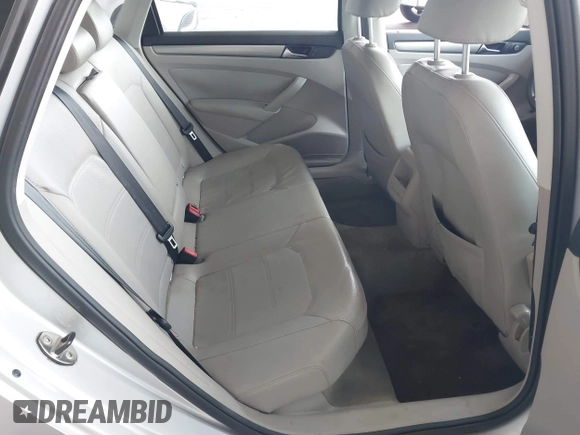 2014 Volkswagen Passat Wolfsburg Edition with VIN 1VWAS7A32EC036193, listed as a IAAI auction lot 41606595 with 77,536 mi miles and . Bid and sale history available at DreamBid. Image 8.
