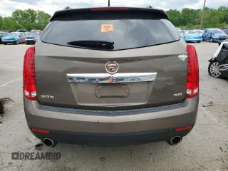 2014 Cadillac SRX Luxury Collection z VIN 3GYFNBE3XES626319, wystawiony jako Copart lot #54776405 z przebiegiem 107 734 mil mil oraz Szkody całkowita. Historia ofert i sprzedaży dostępna na DreamBid. Obrazek 6.