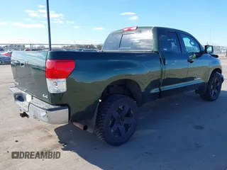 2011 Toyota Tundra 4WD Truck with VIN 5TFUM5F18BX020803, listed as a IAAI auction lot 41856078 with 110,119 mi miles. Bid and sale history available at carsss.com. Image 4.