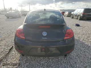 2012 Volkswagen Beetle 2.0T Turbo PZEV with VIN 3VWVA7AT1CM618883, listed as a Copart auction lot 85873174 with 100,482 mi miles and Salvage Title. Bid and sale history available at carsss.com. Image 6.